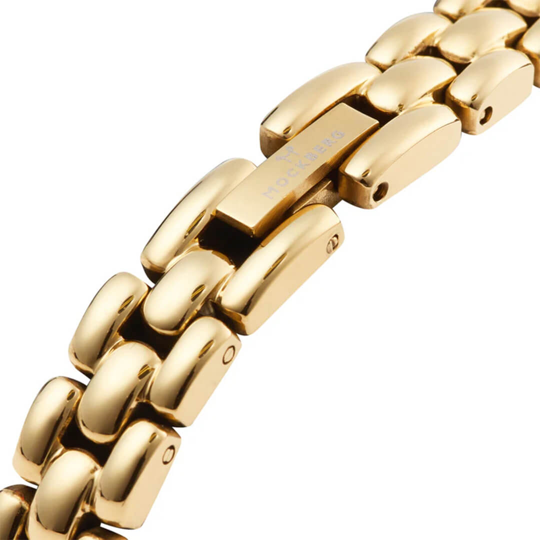 Et produktbilde av en smal analog dameklokke med romerske tallindekser med hvit urskive, og en utrolig lekker lenke.