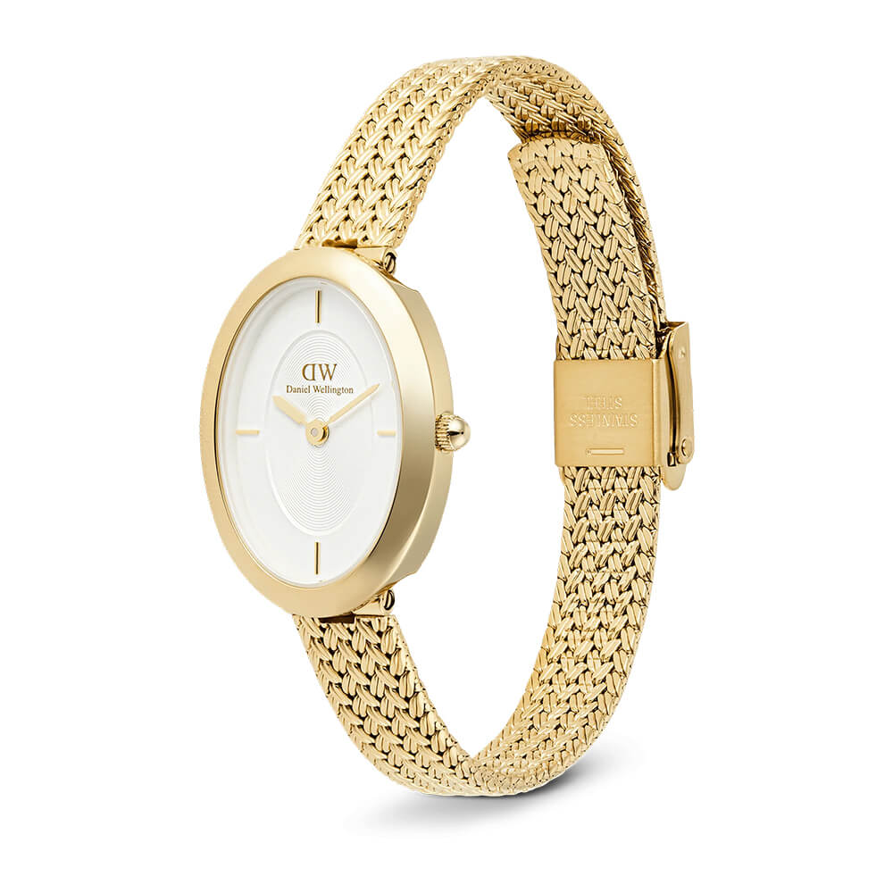 Oval Daniel Wellington-klokke i gull med hvit urskive og flettet lenke.